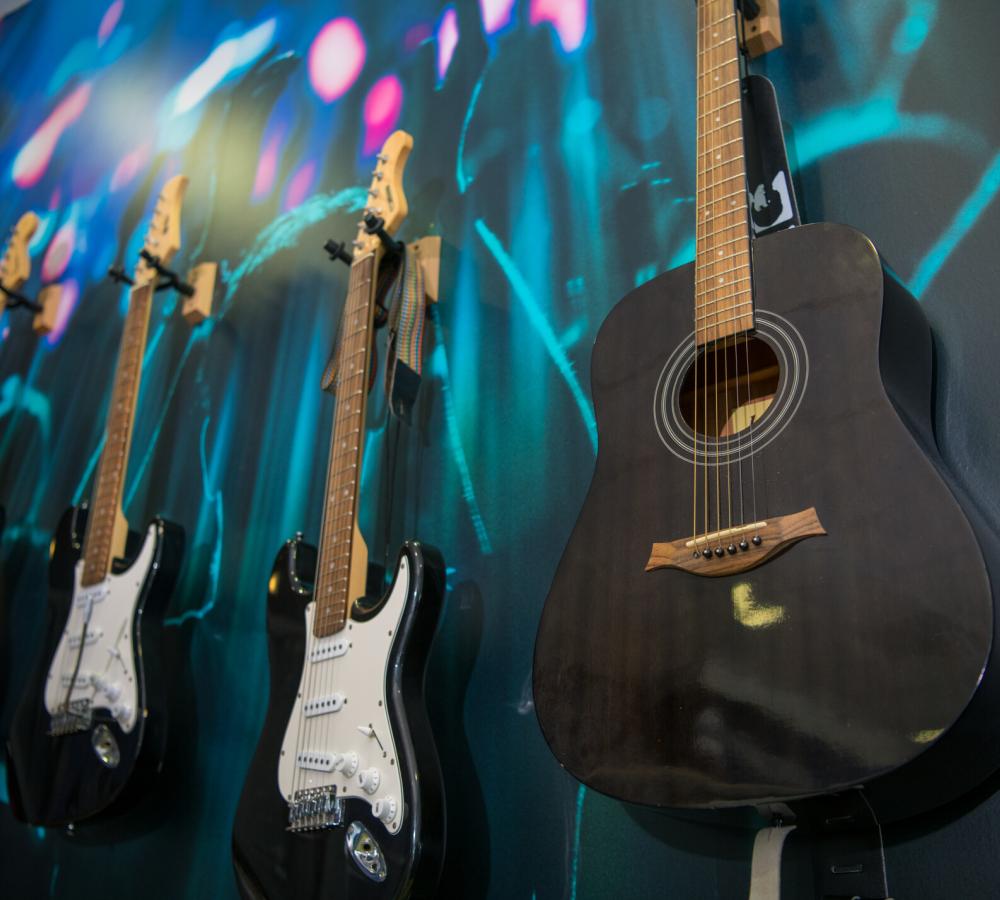 Guitars on wall at Teenage Cancer Trust Unit Unit in Newcastle