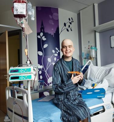 Harry enjoys a Domino's on his hospital unit 