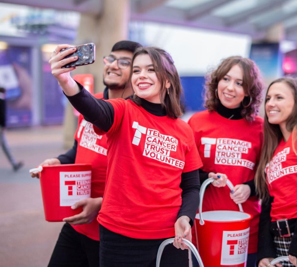 Group of young volunteers taking a selfie