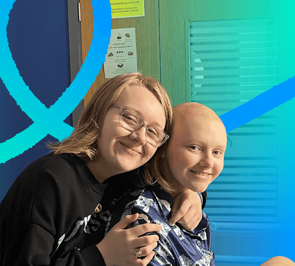 Two young people on a Teenage Cancer Trust ward. There is an applied graphical gradient, with the colours transitioning from tea to a light blue. An addiotnal graphical element with the same gradient, but reversed is applied to a looping ribbon.