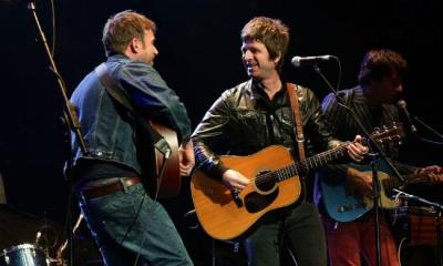 Noel Gallagher and Damon Albarn on stage at Teenage Cancer Trust Royal Albert Hall 2002