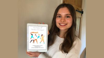 Ellie holding an iPad showing her menopause guide