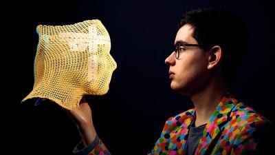 Kaleb holding a radiotherapy mask