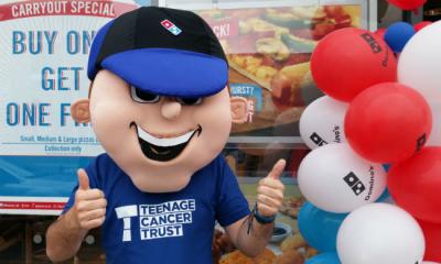 Domino's mascot wearing Teenage Cancer Trust top