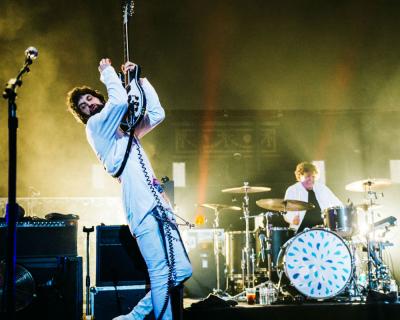 Kasabian on stage at Teenage Cancer Trust Royal Albert Hall 2002