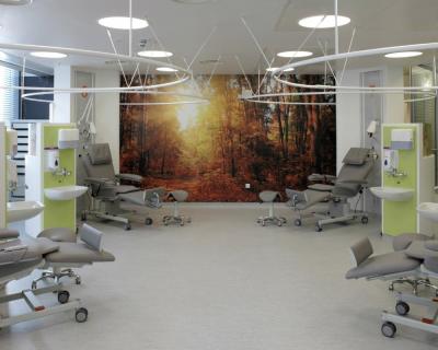 Four individual chairs at the University College Hospital London Cancer Centre's treatment zone