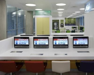 Eight computers in our education zone at the University College Hospital London Cancer Centre