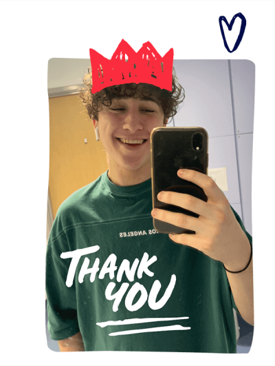 Young person taking a selfie saying thank you