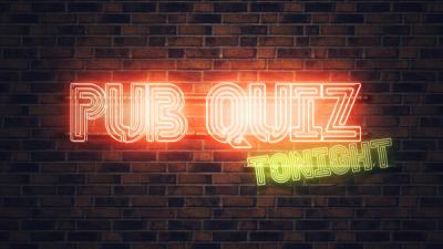 Neon sign which reads 'Pub quiz tonight'