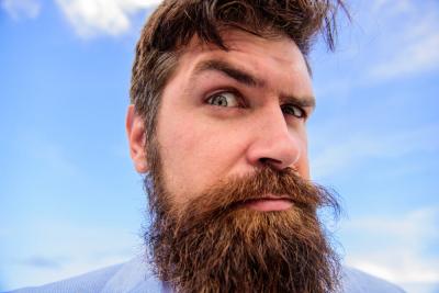 A man who has grown his beard to raise money for Teenage Cancer Trust