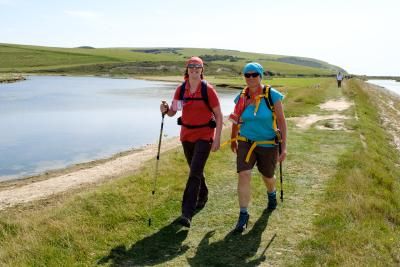 Two people trekking south coast challenge