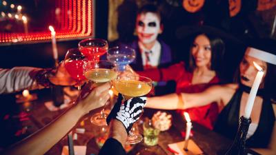 A group of people at a Halloween party to raise money for Teenage Cancer Trust