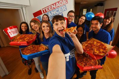 Teenage Cancer Trust staff with Domino's Pizza