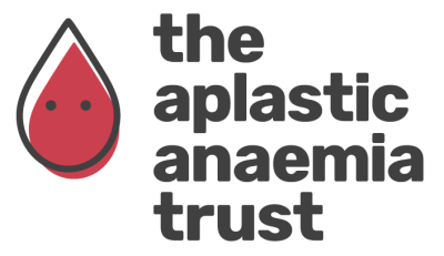 The Aplastic Anaemia Trust logo with black writing and a red droplet on the left hand side