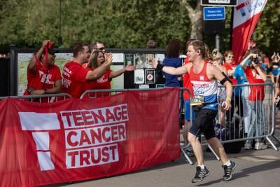 Teenage Cancer Trust runner and volunteers