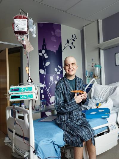 Harry enjoys a Domino's on his hospital unit 