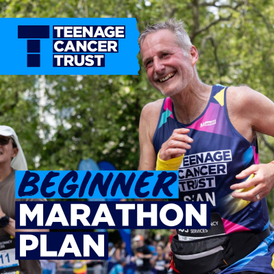 Male runner smiling at camera