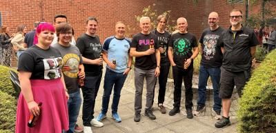 Supporters wearing band tshirts
